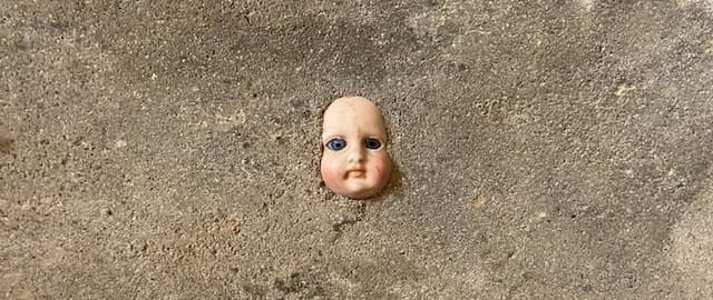 Creepy Baby Doll Head Found Embedded in Cellar Wall—What's the Deal?
