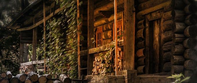 a log cabin isolated in the woods