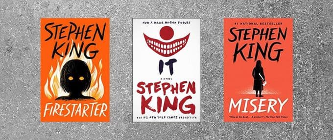 The covers of "Firestarter," "It," and "Misery" by Stephen King.